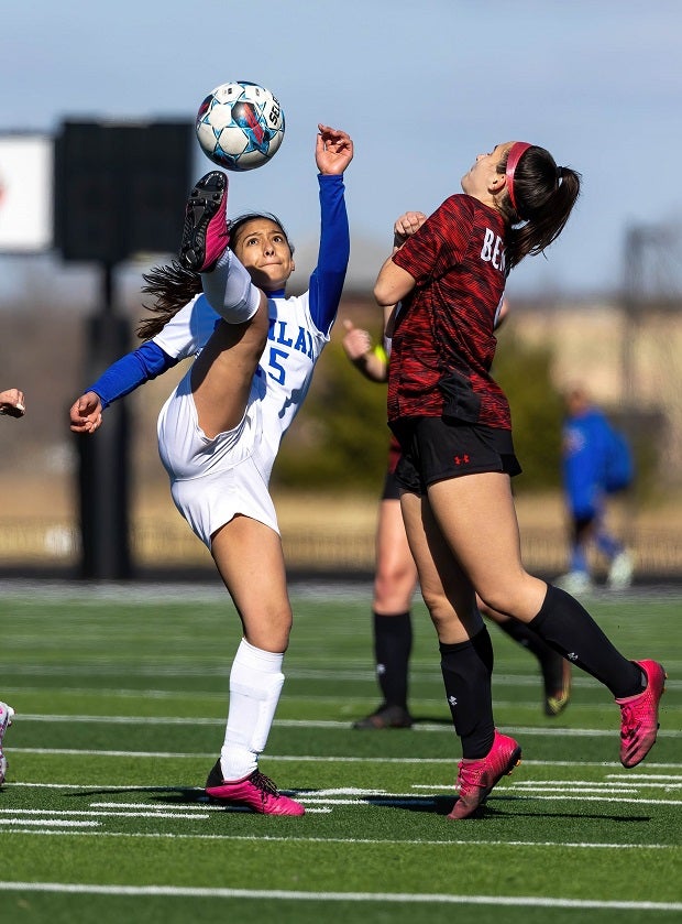 Two players battle for the ball during a recent match between Ford and Braswell during the Forney Lady Rabbits Invitational Tournament. (Photo: Robbie Rakestraw)