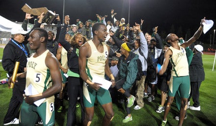 The Poly boys and girls celebrate the announcement of team titles for both squads.