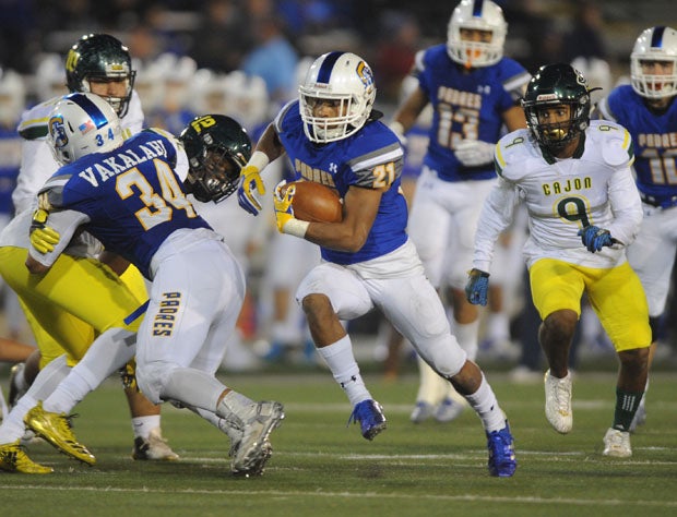 Serra's David Coker rushed for a game-high 140 yards and a touchdown.