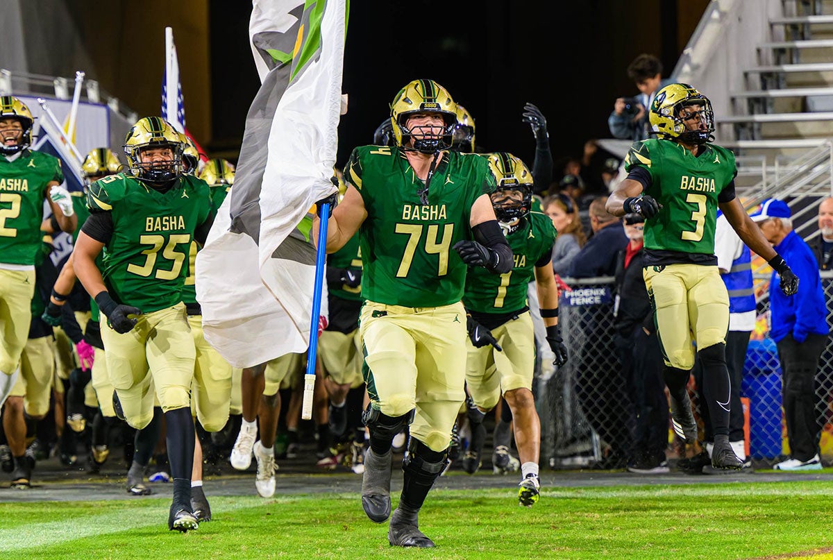 Four-star Arizona State commit Jake Hildebrand leads Basha on to the field against Chandler in the 2025 state championship. The Bears start the 2026 season ranked as the No. 1 team in Arizona. (PHOTO: Jack Beasley)