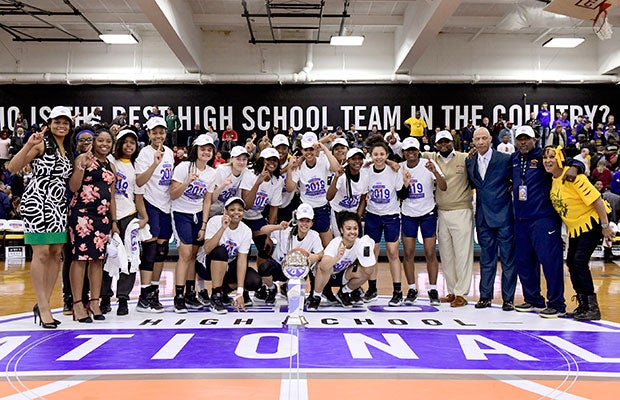 New Hope Academy poses after beating St. John's 45-34 in the girls GEICO Nationals title game on Saturday in New York City.