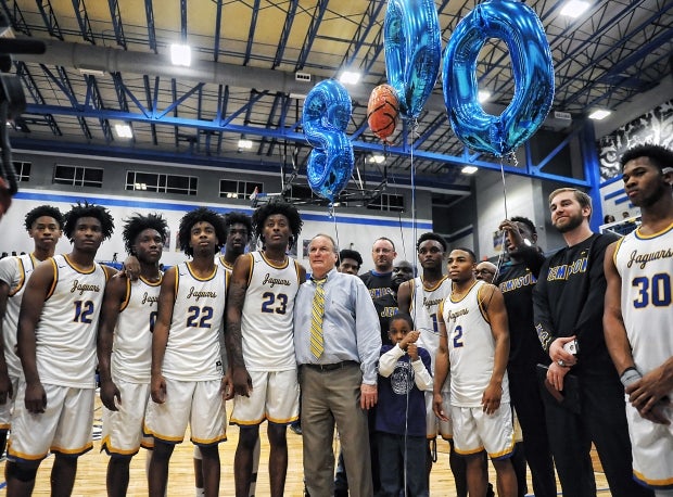 Jack Doss (center with tie) celebrated his 800th win in January after a 68-37 win over Lee.