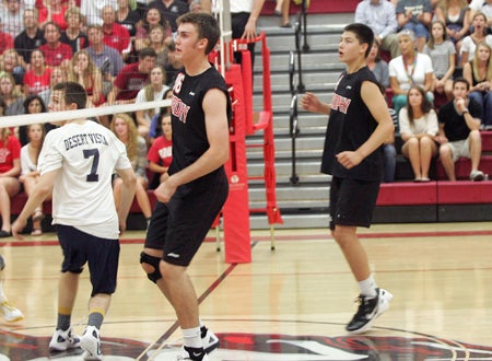 Brophy players Ryan Dowd, left, and Ryne Benson watch as the Broncos get a point in their three-game sweep of Desert Vista in the state quarterfinals.
