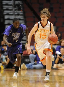 Sophomore Casey Benson was under
control and on target with a team-
high 22 points.