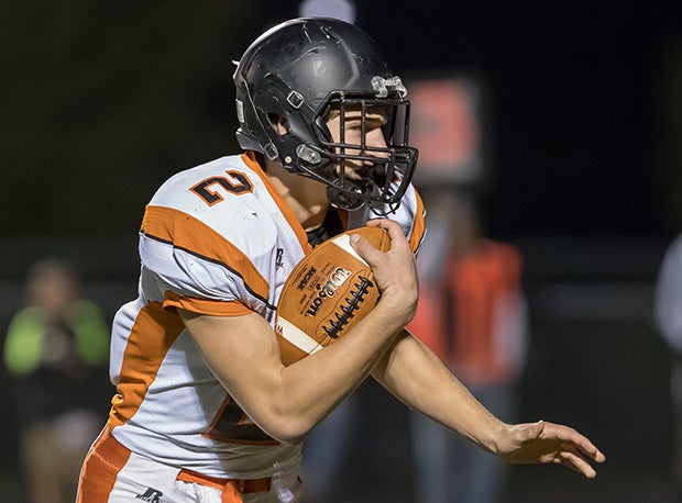 Minster's Jared Heulsman ran for two touchdowns and threw for two more in a win over defending state champion Fort Recovery last week.