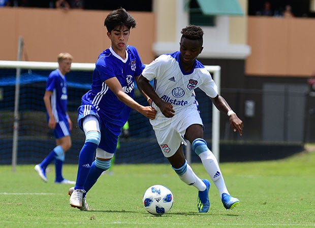Yaya Bakayoko of Team Twellman dribbles the ball in the inaugural Allstate All-America Cup boys soccer game Wednesday in Orlando, Fla. Bakayoko's team beat Team McBride 5-4 in penalty kicks.