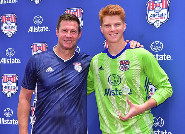 Brian McBride poses with Allstate Cup Man of the Match Jamis Fite.