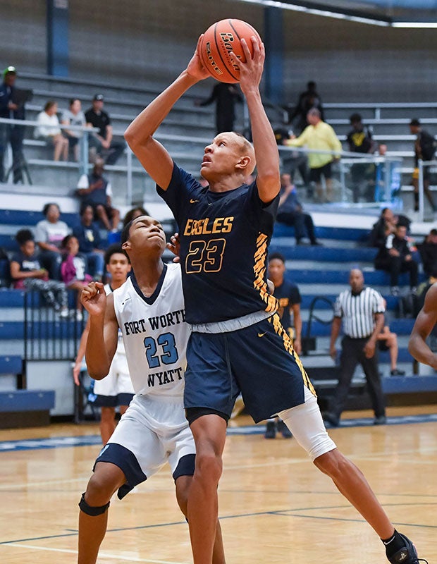 Wing Jordan Walsh is shown playing at Oak Cliff Faith Family Academy (Texas) during the 2018-2019 season.