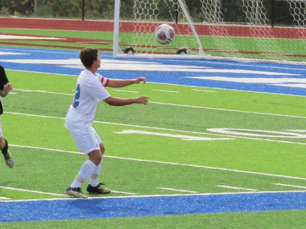 Justin Fitzpatrick is a three-sport athlete, competing in soccer, football and track and field. He will earn his high school diploma this spring, but will also graduate with an associate's degree.
