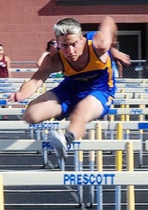In addition to football, Amos competes 
in wrestling and track and field.