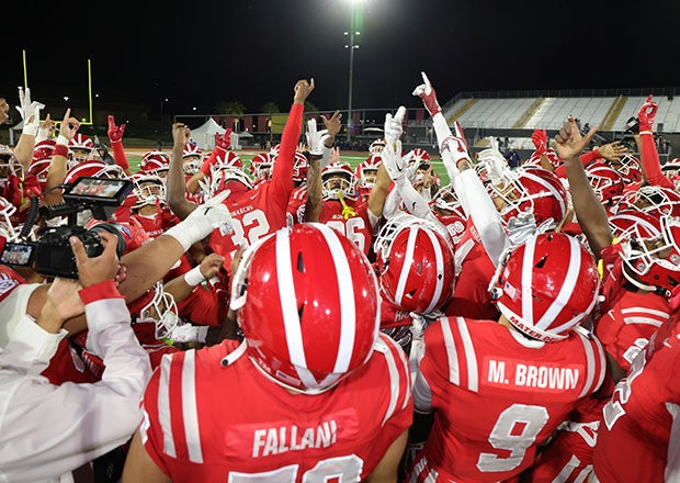 Mater Dei celebrates its win over Serra in California's Open Division state championship game. The Monarchs earned the final No. 1 ranking from four of seven media outlets polled for the media composite top 25. (Photo: Steven Silva)