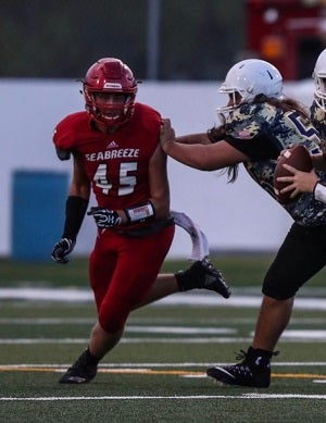 Justice plays defensive end and tight end for
the Sandcrabs, who end their season on Friday.