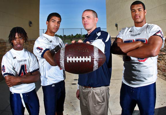 From left to right: Mark Jenkins, Cody Demps, head coach Joe Cattolico, Arik Armstead.