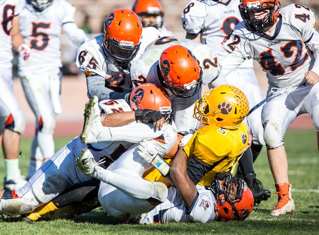 Balboa (white uniforms) and Mission (yellow) played a tense, hard-hitting San Francisco Section title game in the 92nd Turkey Day Game at Kezar Stadium. Mission won its second straight championship with a 14-13 victory.