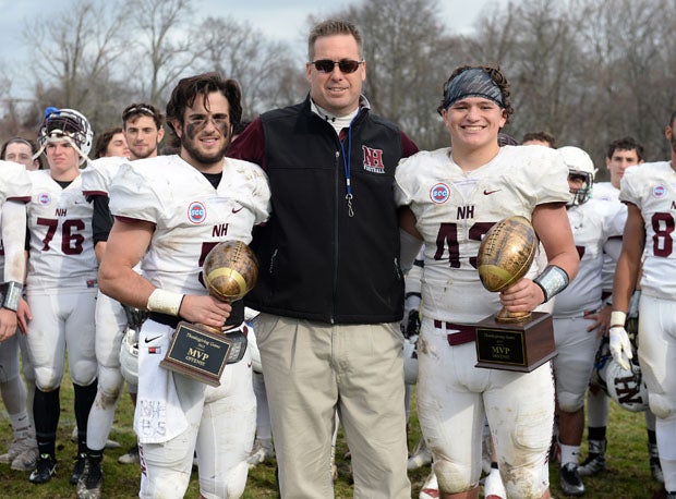 North Haven (Conn.) defeated Amity (Woodbridge, Conn.), 62-30, on Thanksgiving Day to complete the program's first-ever perfect regular season, finishing at 10-0, which earned it the top seed in the CIAC Class L playoffs starting on Tuesday. Head coach Anthony Sagnella (middle) is flanked by the game's offensive MVP, Mike Montano (left) and defensive MVP David Mikos.