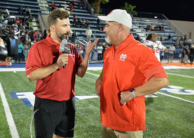 Mater Dei head coach Raul Lara was all smiles speaking about his team after the game to MaxPreps sideline reporter Chris Stonebraker. (PHOTO: Jules Carney)