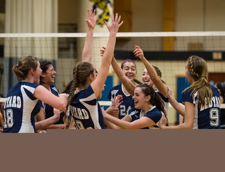 Ledyard celebrates its first CIAC Class M girls volleyball title on Saturday.