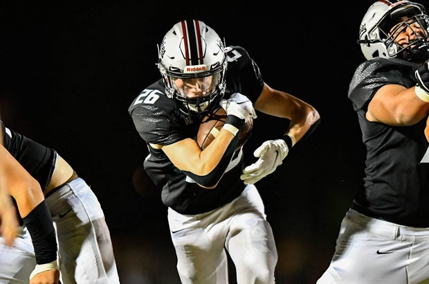 Hamilton running back Logan Krei rushed for a 15-yard touchdown in the first half of the Huskies' 21-14 win over Chandler. 