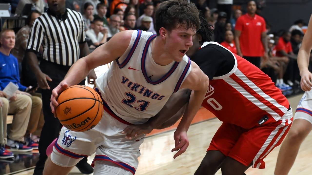 BASKETBALL: Wisconsin Lutheran three-peats