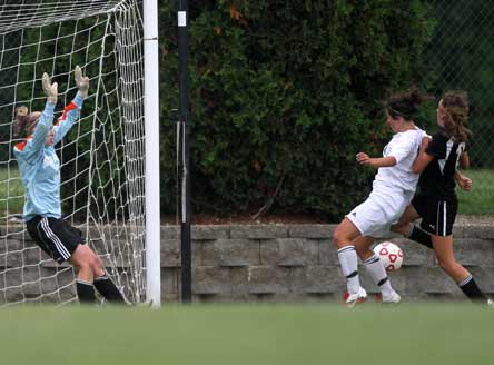 Alissa Viste, left, has to stay aware of scoring threats on the soccer field. Off the field, she has to stay aware of complications from Type-1 diabetes. Nearly one in 400 children in America have Type-1 diabetes.