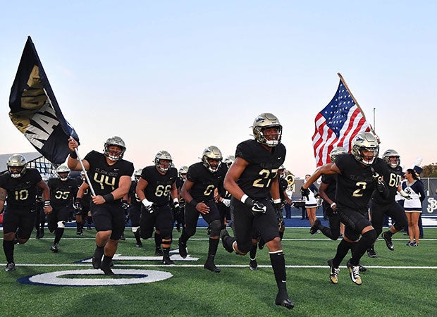 St. John Bosco takes the field in 2019.