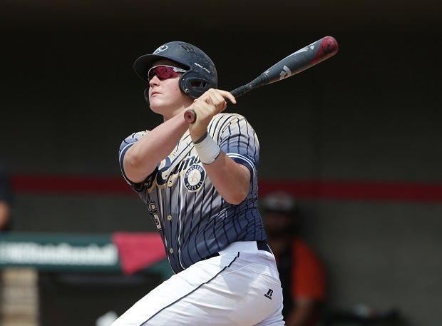 Will Butcher of T.C. Roberson watches his grand slam home run sail over the fence during the Class 4A state finals against New Hanover.