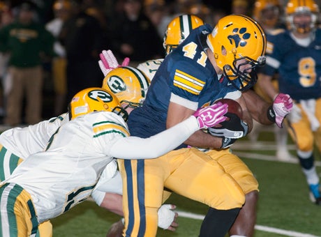 St. Ignatius running back Tim McVey got his yards but St. Edward's swarming defense did just enough to pull out a 20-13 win on Saturday night.