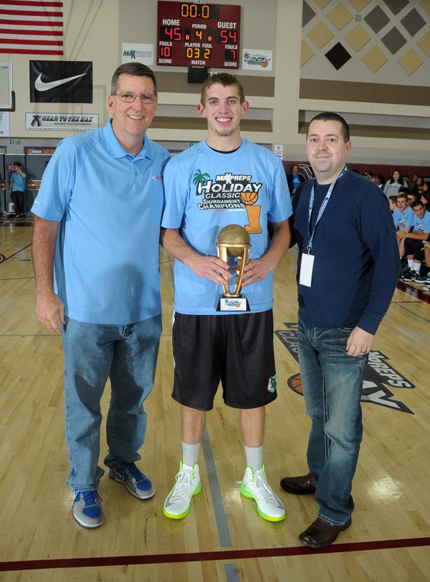 Jason Todd is sandwiched between MaxPreps founder and President Andy Beal (left) and MaxPreps national basketball editor Jason Hickman after winning the MVP trophy Monday night.