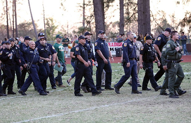 The first responders to The Camp Fire were given a resounding standing ovation before Paradise's game with Williams on Friday. 