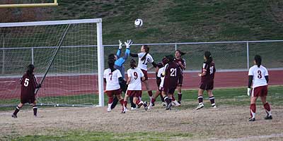 Lady Grizzly Yesenia Samano (right) goes up against an opponent during the first half of the Grizzlies home game
