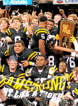 Neville celebrated a 2014 state title.