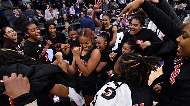 Etiwanda teammates celebrate with Jada Sanders (middle) after her last-second putback gave the sixth-ranked Eagles a 69-67 CIF Open Division title over No. 8 Archbishop Mitty. (Photo: David Steutel)