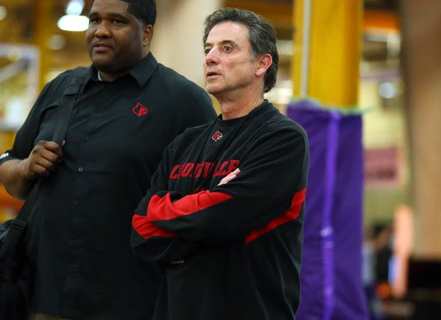 Louisville's Rick Pitino watches from the sideline during a game on court 6.