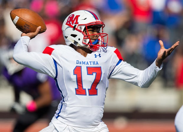 DeMatha quarterback Beau English drops back to pass during his team's 23-13 victory over Gonzaga on Saturday.