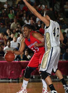 Kelsey Bone goes up against Brittney
Griner in a high school game.
