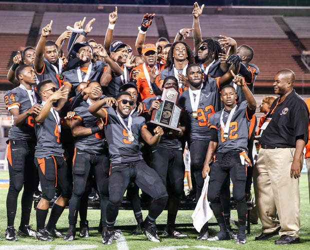 Booker T. Washington celebrates its second straight Florida 4A title and likely mythical national crown following a 40-21 win over Bolles Saturday at the Citrus Bowl. 