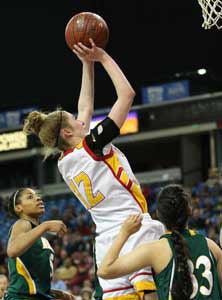 Berkeley senior Rachel Howard goes
up for two of her 13 points.