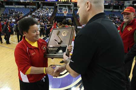 Berkeley coach Cheryl Draper accepts championship trophy.