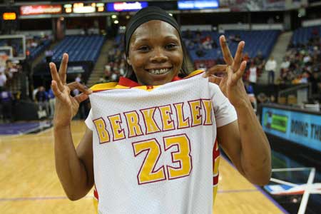 Berkeley's Elisha Davis celebrates her team's 11th regional title (see details below).