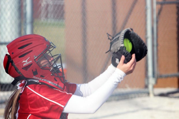 Catcher Lexi Madrigal catches a foul popup.
