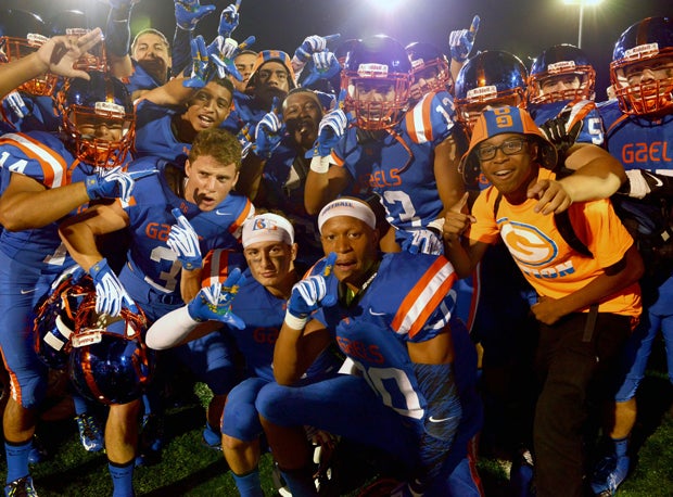 Bishop Gorman players celebrate after their win over St. John Bosco.