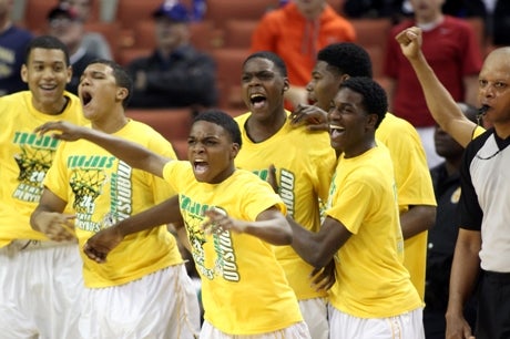Madison players celebrate as the clock ticks down during their title-game victory over Yates.