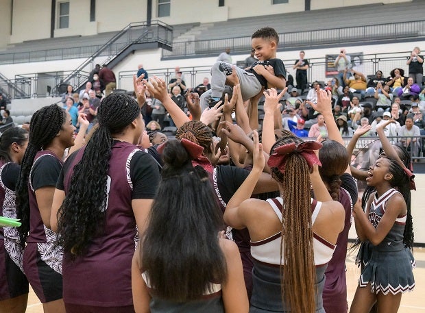 Players and cheerleaders for No. 12 Mansfield Timberview of Texas celebrate a Feb. 15 win over Aledo. The 39-1 Wolves play Cedar Park on Thursday in the Class 5A semifinals. (Photo: Kirsten Gallon)