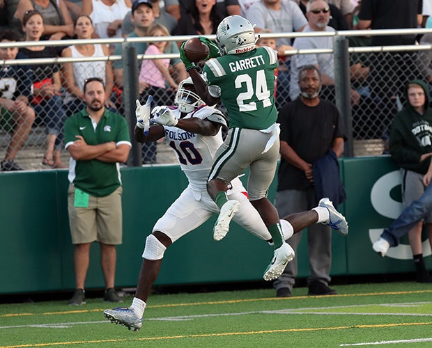 De La Salle defensive back Shamar Garrett makes the first of his two interceptions.