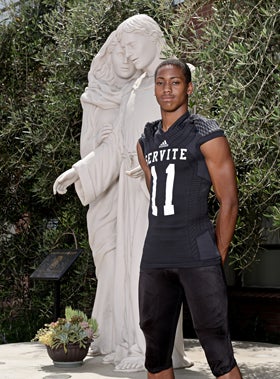 Travis Waller, Servite