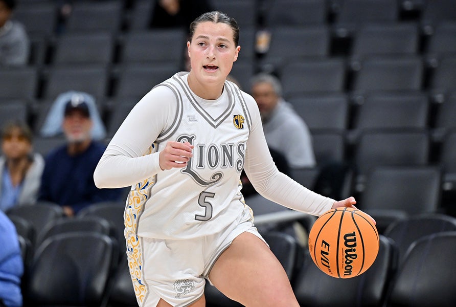 Faith Christian senior Lauren Harris brings the ball upcourt during the CIF Division IV state championship game Saturday at Golden 1 Center. Harris scored 26 points to lead the Lions to their first state crown in school history. (PHOTO: David Steutel)