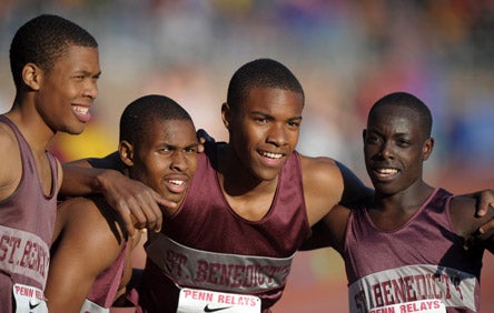 The St. Benedict Prep (N.J.) distance medley team celebrates its Championship of America title. Anchor Edward Cheserek, who ran a sterling 1,600, is on far right.