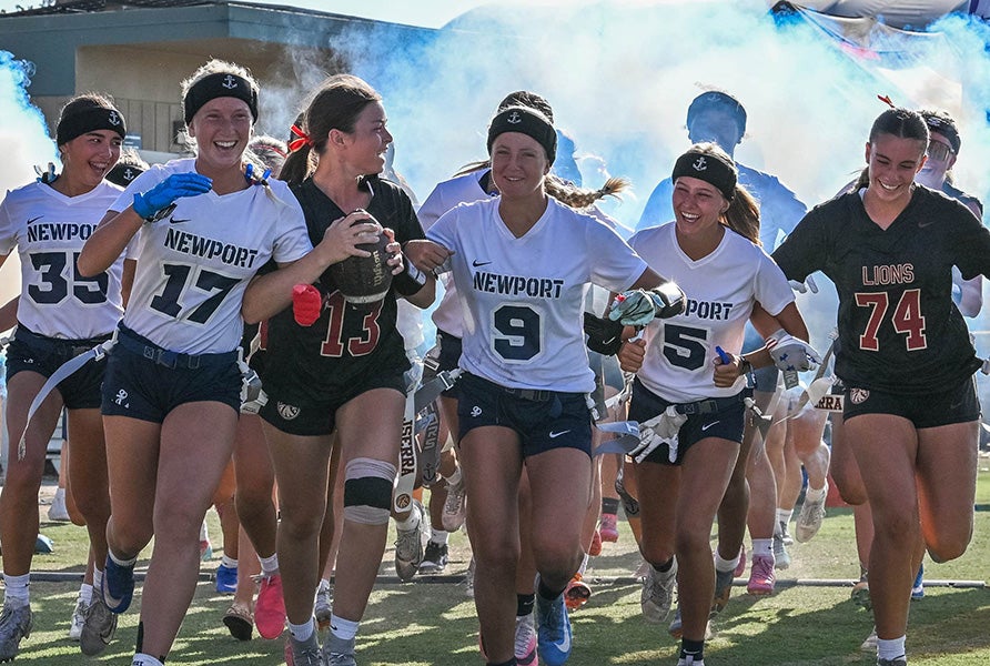MaxPreps Flag Football Showdown championship game opponents JSerra Catholic and Newport Harbor took the field together Saturday in the San Diego area. JSerra emerged as the winner to claim the inaugural MaxPreps FFS title. (PHOTO: Mike Manzano)