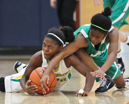 Jemerigbe personifies her teams toughness and tenacity going after a loose ball. 