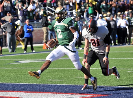 Dontre Wilson (2) finishes off Coppell's fate for DeSoto with another touchdown run on Saturday. 